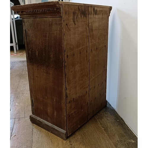 540 - A pine collectors cabinet, with two cupboard doors, to reveal a fitted interior, 53 cm wide