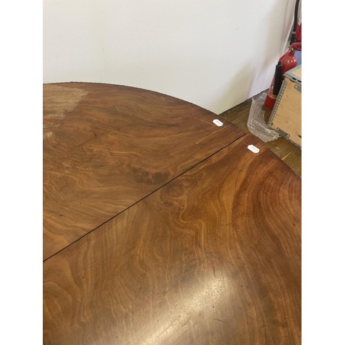 504 - A 19th century mahogany breakfast table, 137 cm wide