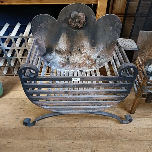 607 - A cast iron fire basket, 71 cm wide