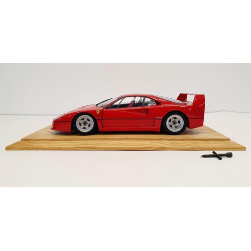 1108 - ***WITHDRAWN***A Kyosho model of a Ferrari F40, in a perspex case