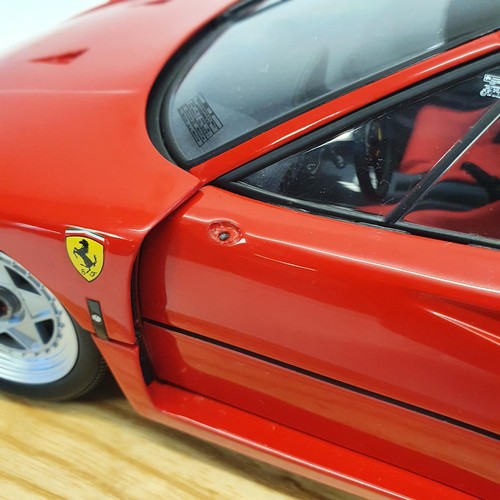 1108 - ***WITHDRAWN***A Kyosho model of a Ferrari F40, in a perspex case