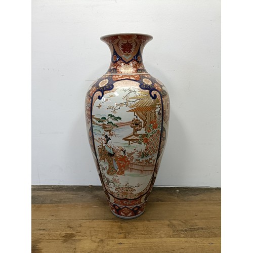 42 - A large Japanese Imari vase, decorated landscape with figures, 90 cm high