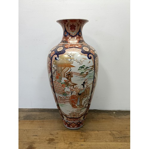 42 - A large Japanese Imari vase, decorated landscape with figures, 90 cm high