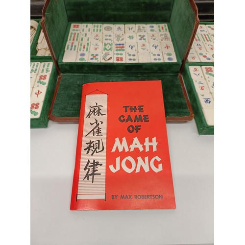 92 - A Mah-Jong set, in a leather case, and four stands (5)