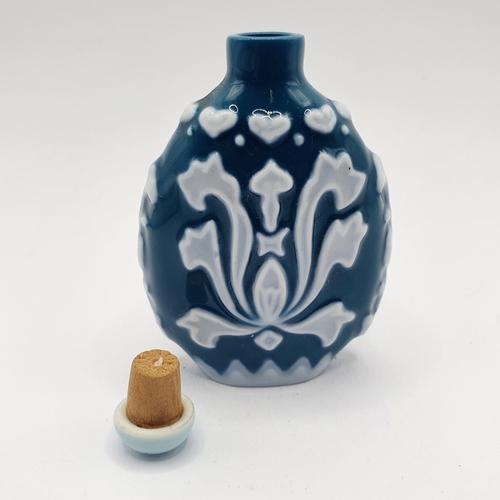 11 - A Chinese porcelain snuff bottle, 6 cm high 
Provenance: From a single owner collection of snuff bot... 