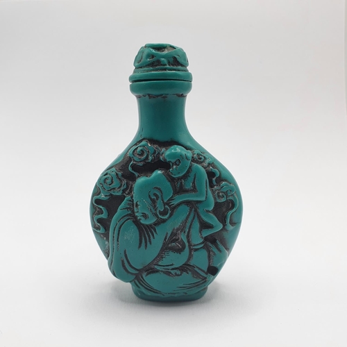 17 - A Chinese turquoise coloured snuff bottle, 7 cm high  
Provenance: From a single owner collection of... 