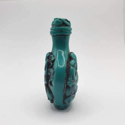 17 - A Chinese turquoise coloured snuff bottle, 7 cm high  
Provenance: From a single owner collection of... 