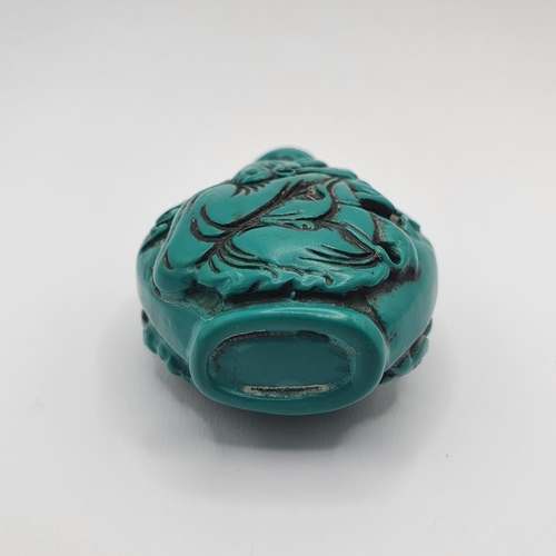 17 - A Chinese turquoise coloured snuff bottle, 7 cm high  
Provenance: From a single owner collection of... 