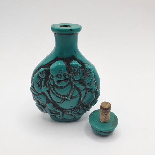 17 - A Chinese turquoise coloured snuff bottle, 7 cm high  
Provenance: From a single owner collection of... 