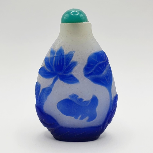 19 - A Chinese blue and white cased glass snuff bottle, 7 cm high
Provenance: From a single owner collect... 