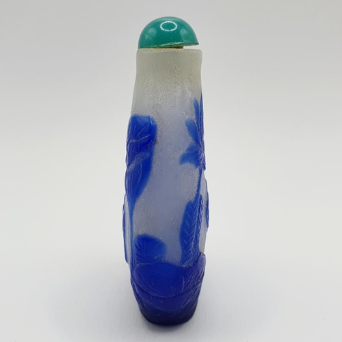 19 - A Chinese blue and white cased glass snuff bottle, 7 cm high
Provenance: From a single owner collect... 