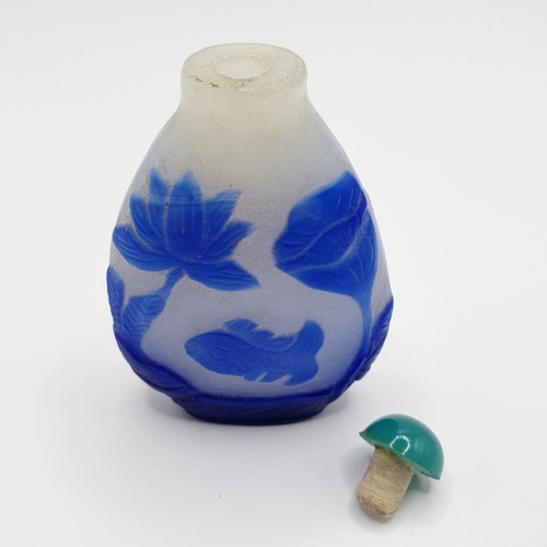 19 - A Chinese blue and white cased glass snuff bottle, 7 cm high
Provenance: From a single owner collect... 