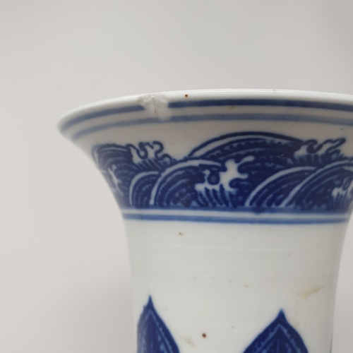 2 - A Chinese blue and white bottle vase, decorated flowers in underglaze blue, bears a Qianlong mark, 3... 