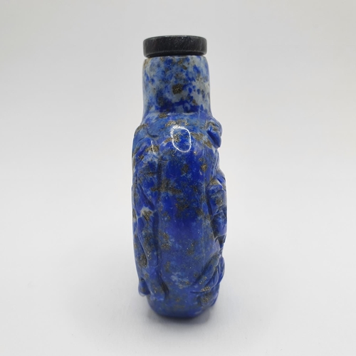 20 - A Chinese carved blue stone snuff bottle, 7 cm high
Provenance: From a single owner collection of sn... 