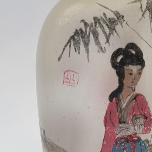 22 - A Chinese glass snuff bottle, the interior painted a figure, 9 cm high 
Provenance: From a single ow... 