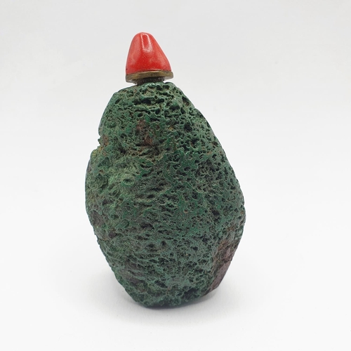 28 - A Chinese green stone snuff bottle, 7.5 cm high Provenance: From a single owner collection of snuff ... 