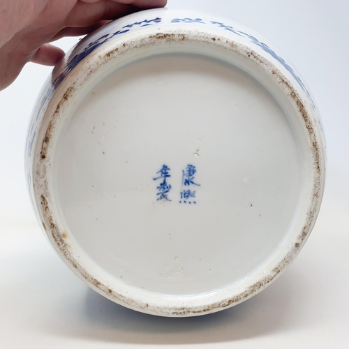 3 - A Chinese blue and white ginger jar, decorated a landscape with a building, character mark to base, ... 