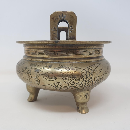 31 - A Chinese bronze censer, decorated birds and flowers, six character mark to base, 16 cm wide