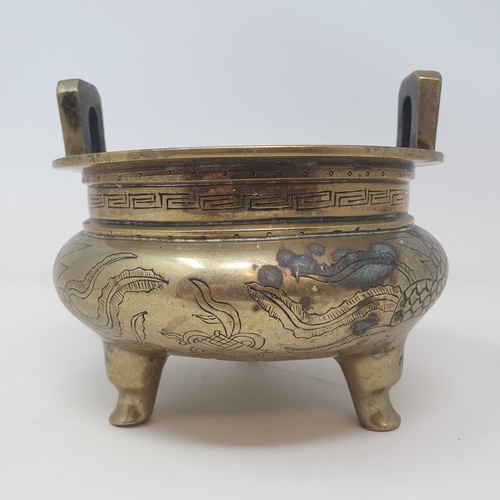 31 - A Chinese bronze censer, decorated birds and flowers, six character mark to base, 16 cm wide