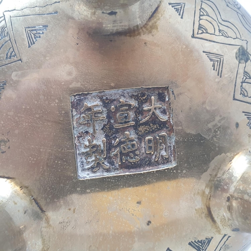 31 - A Chinese bronze censer, decorated birds and flowers, six character mark to base, 16 cm wide