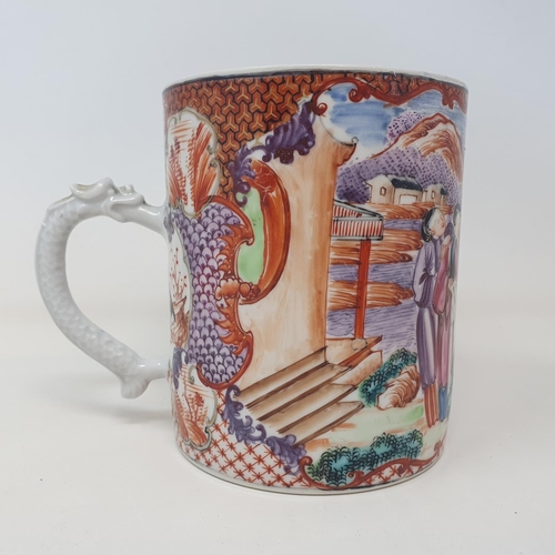 33 - A Chinese export ware mug, decorated figures, 13 cm high
Provenance:  From a Dorset collection