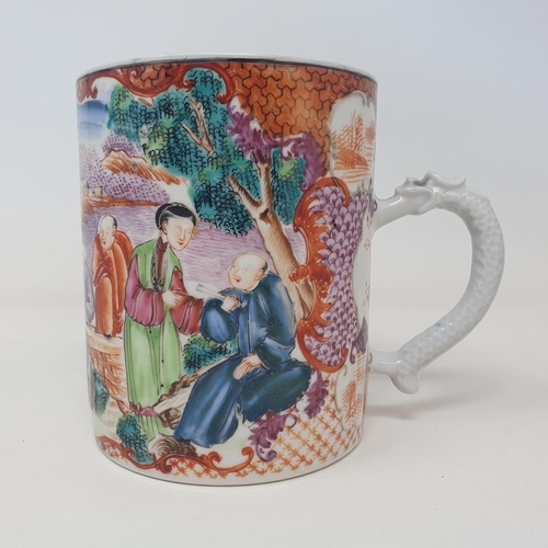 33 - A Chinese export ware mug, decorated figures, 13 cm high
Provenance:  From a Dorset collection