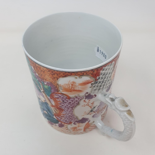 33 - A Chinese export ware mug, decorated figures, 13 cm high
Provenance:  From a Dorset collection