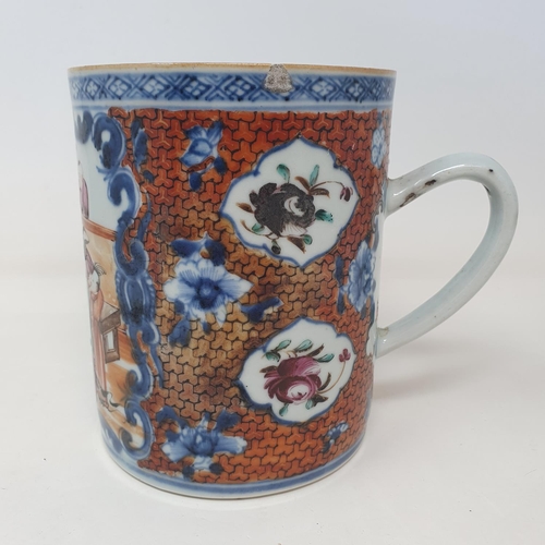 35 - A Chinese export ware mug, decorated figures, 14 cm high  
Provenance:  From a Dorset collection