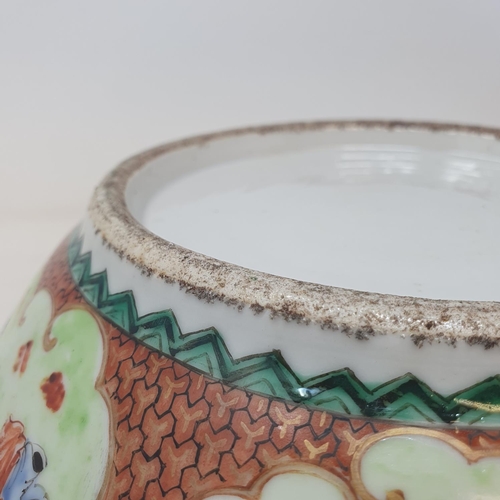 36 - A Chinese export ware bowl, decorated figures, 28 cm diameter 
Provenance:  From a Dorset collection