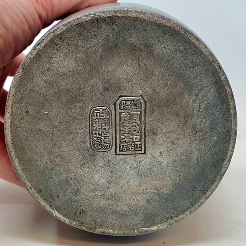 57 - A Chinese pewter caddy, decorated flowers, 24 cm high