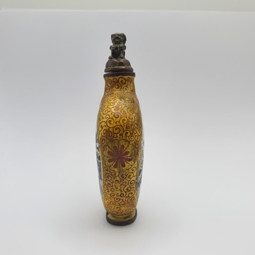 7 - A Chinese cloisonné snuff bottle, with a character mark to base, 9.5 cm high   
Provenance: From a s... 