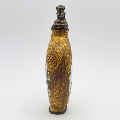 7 - A Chinese cloisonné snuff bottle, with a character mark to base, 9.5 cm high   
Provenance: From a s... 