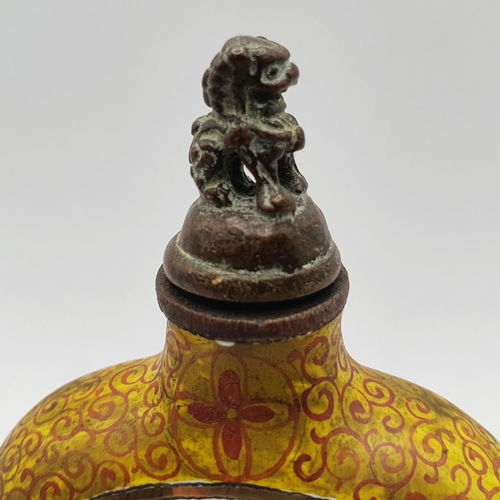 7 - A Chinese cloisonné snuff bottle, with a character mark to base, 9.5 cm high   
Provenance: From a s... 