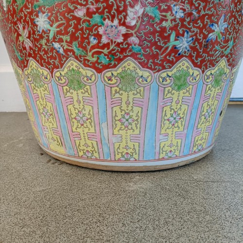 41 - A large pair of Chinese floor vases, of baluster form, decorated flowers and birds in enamel colours... 