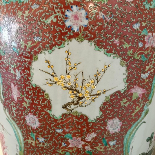 41 - A large pair of Chinese floor vases, of baluster form, decorated flowers and birds in enamel colours... 