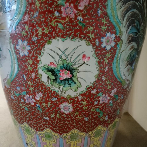 41 - A large pair of Chinese floor vases, of baluster form, decorated flowers and birds in enamel colours... 