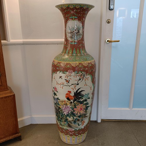 41 - A large pair of Chinese floor vases, of baluster form, decorated flowers and birds in enamel colours... 