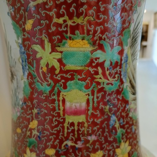 41 - A large pair of Chinese floor vases, of baluster form, decorated flowers and birds in enamel colours... 