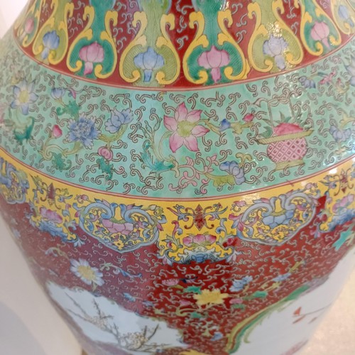 41 - A large pair of Chinese floor vases, of baluster form, decorated flowers and birds in enamel colours... 