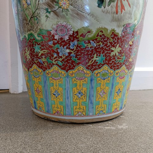 41 - A large pair of Chinese floor vases, of baluster form, decorated flowers and birds in enamel colours... 