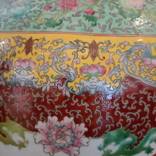 41 - A large pair of Chinese floor vases, of baluster form, decorated flowers and birds in enamel colours... 