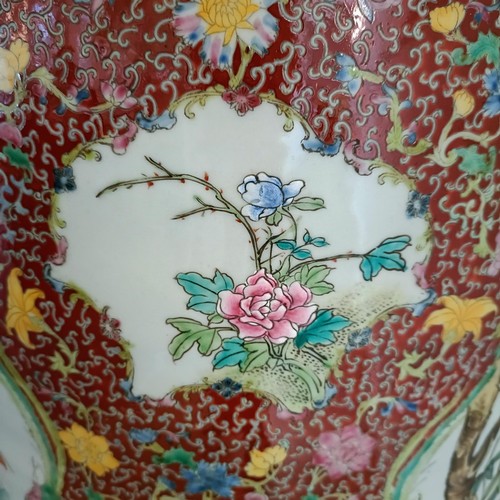 41 - A large pair of Chinese floor vases, of baluster form, decorated flowers and birds in enamel colours... 