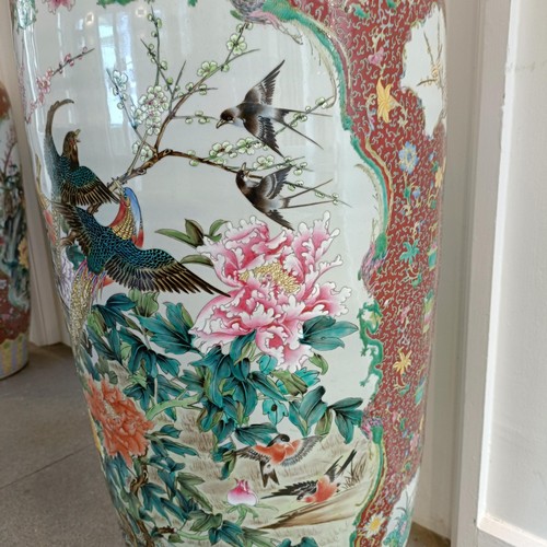 41 - A large pair of Chinese floor vases, of baluster form, decorated flowers and birds in enamel colours... 