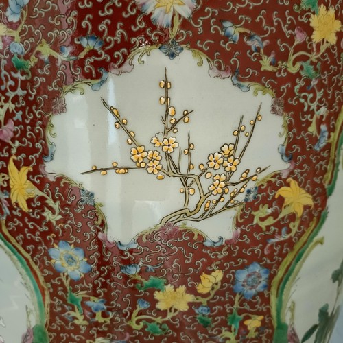 41 - A large pair of Chinese floor vases, of baluster form, decorated flowers and birds in enamel colours... 