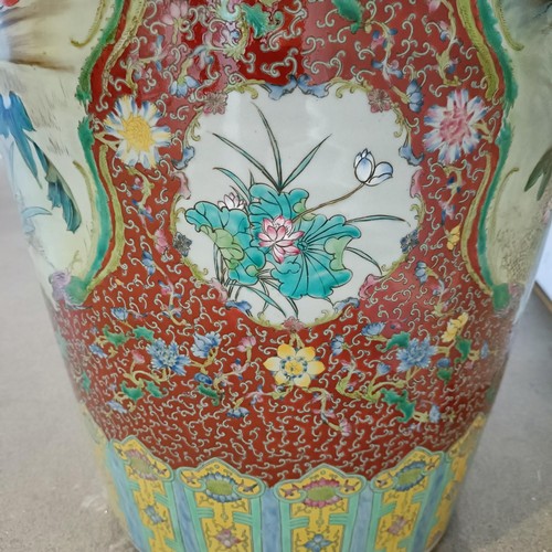 41 - A large pair of Chinese floor vases, of baluster form, decorated flowers and birds in enamel colours... 