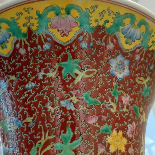 41 - A large pair of Chinese floor vases, of baluster form, decorated flowers and birds in enamel colours... 