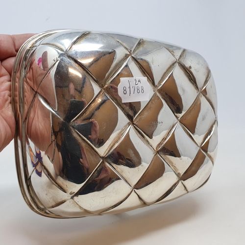 572 - An unusual silver basket in the form of a trug, with basket weave style decoration and a fixed handl... 