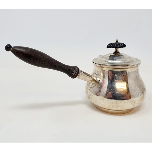 639 - A late 18th century silver brandy pan, with a finial and a turned wood handle, London 1792, 8.4 ozt ... 