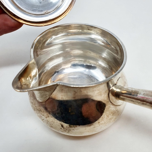 639 - A late 18th century silver brandy pan, with a finial and a turned wood handle, London 1792, 8.4 ozt ... 