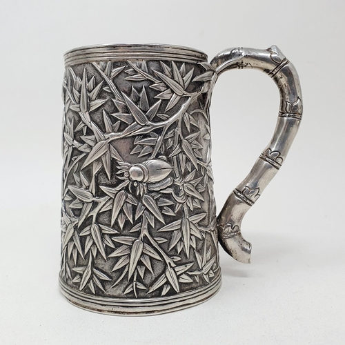 649 - A 19th century Chinese silver coloured metal mug, of tapering cylindrical form, inscribed and dated ... 